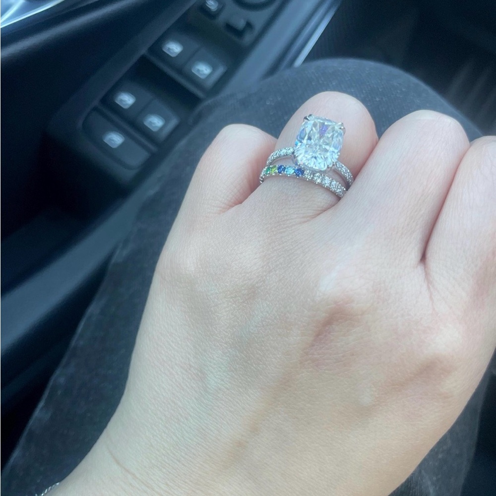 14k white gold, moissanite and gem stone eternity band.